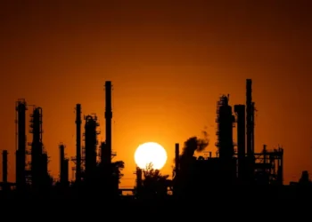 Fossil fuel giants intensify lobbying to seek immunity from climate lawsuits